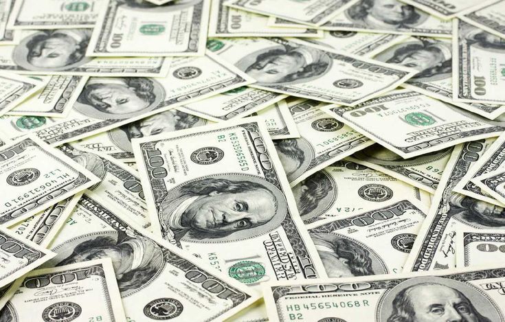 ilustrasi tumpukan mata uang dollar Amerika